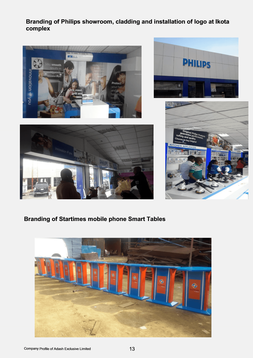 Row of finished blue and orange StarTimes mobile display pedestal tables in the workshop.